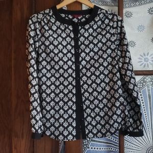 Black and white collarless button down blouse